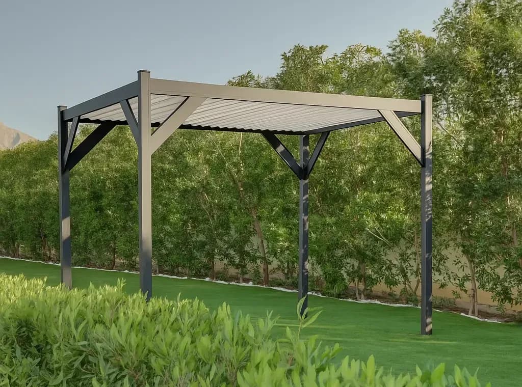 Aluminum pergola with a white louvered roof on a paved patio