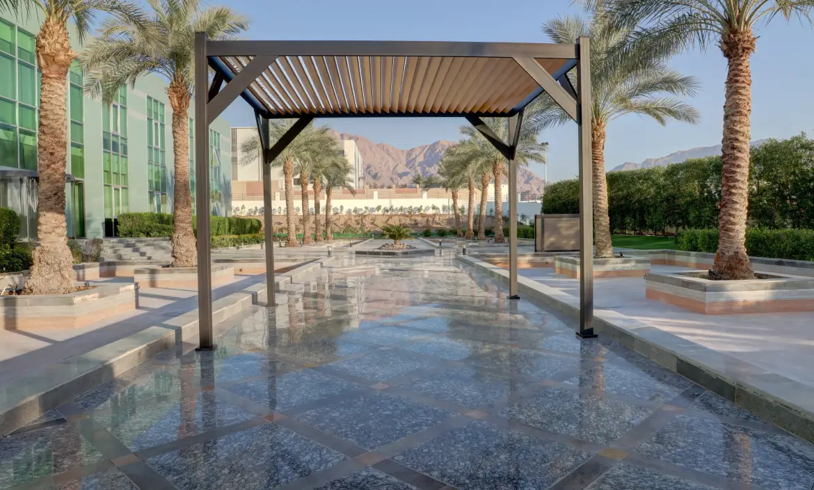 Aluminum louvered pergola with an adjustable roof