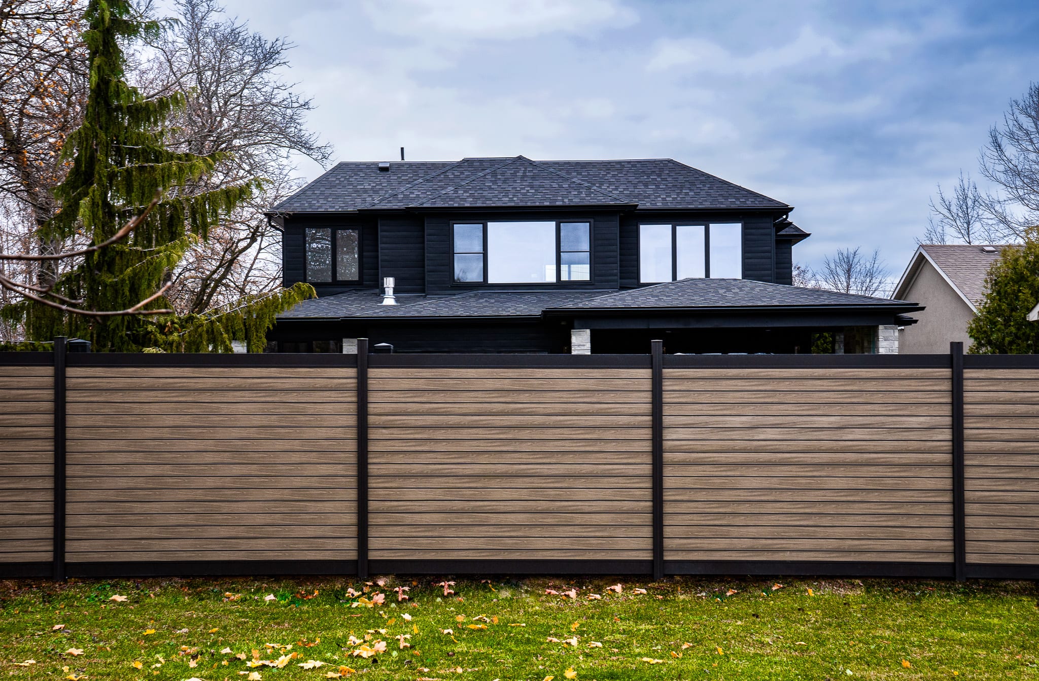 Aluminum post privacy fence installed in Canadian residential yard